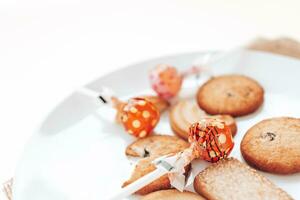 Butter cookies in a white plate on a white background. photo