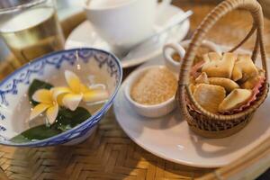 Cappuccino coffee served in a Thai style coffee shop photo