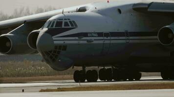 NOVOSIBIRSK, RUSSIAN FEDERATION OCTOBER 20, 2021 - Soviet and Russian heavy military transport aircraft IL 76MD. Close up of transport plane IL 76 video