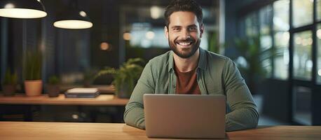 Happy freelancer man enjoying remote work and self employment smiling at camera photo