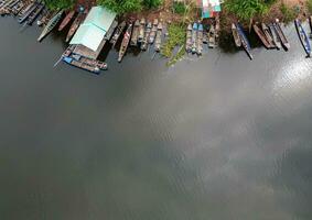 Many fishing boats land in the lagoon waiting to catch fish. photo