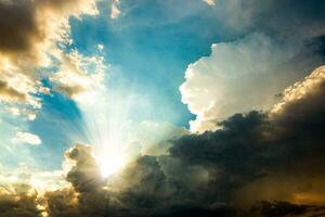 Dramatic morning sky with dark rain clouds photo