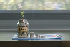 Growth money of profitability of professional investment planning, Business and finance concept. coins and calculators, financial accounting concepts and save money. photo