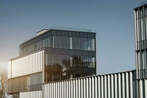 Minsk, Belarus, July 2023 - exterior modern glass building photo