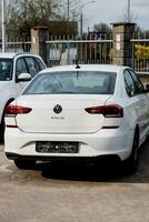 Minsk, Belarus, July  2023 - Rear view white Volkswagen Polo photo