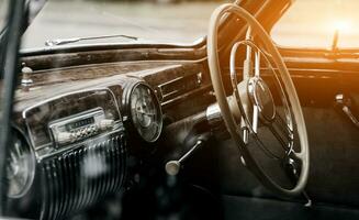 Steering wheel of a classic automobile. photo