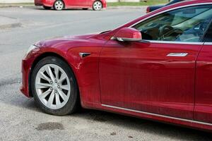 Minsk, Belarus, July  2023 - red Tesla Model S photo