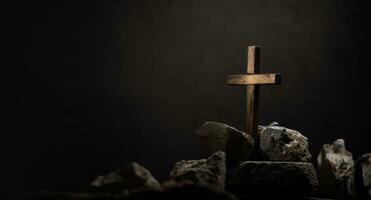 Spirituality, Religion and Hope Concept. Praying in the Dark Place. Supplication, Believe and Faith for Human. Hope in the midst of the Broken. Cross on  Wreckage Concrete. Light Shining on the Cross photo