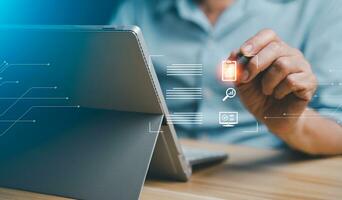 Businessmen use laptops to access information in online documents. Document Management System concept, Digital document on a virtual notebook screen using a stylus pen. photo