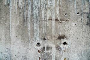 vintage cement wall with flowing color. old wall texture grunge background. photo