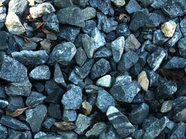 Background of stone pebbles. Texture of stone pebbles. photo