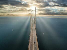 Panoramic aerial close up view of Oresund bridge over the Baltic sea photo