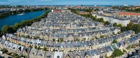 Aerial view of the rooftops of Kartoffelraekkerne neighborhood, in Oesterbro, Copenhagen, Denmark. photo