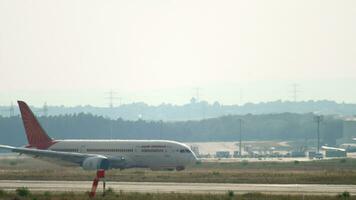 FRANKFURT AM MAIN, GERMANY JULY 17, 2017 - Boeing 787 of Air India arrival, taxiing at Frankfurt airport. Passenger modern aircraft dreamliner on the airfield. Tourism and travel concept video