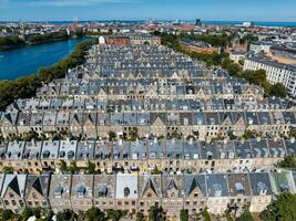 Aerial view of the rooftops of Kartoffelraekkerne neighborhood, in Oesterbro, Copenhagen, Denmark. photo