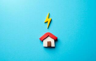 Providing electricity at home. Household powered by an energy source. Efficient use of electricity to reduce costs, lower environmental impact. Utilities supplies services. Thunderstorm alert photo