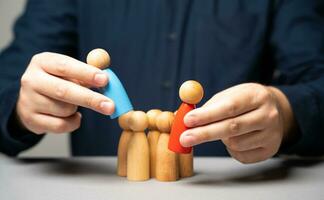 Replacing the group leader with a new candidate. Change of leader to a loyal one. Effective communication and a clear plan for a smooth handover. photo
