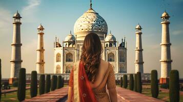 mujer en sari a taj mahal, India. ai generativo foto