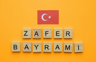 August 30, Turkey Victory Day, zafer bayrami, flag of Turkey, minimalistic banner with wooden letters photo