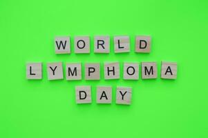 September 15, World Lymphoma Awareness Day, minimalistic banner with the inscription in wooden letters photo