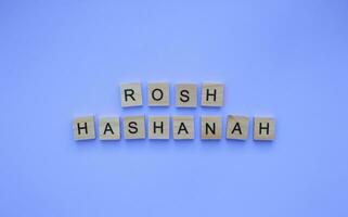 September 15-17, Rosh Hashanah, minimalistic banner with an inscription in wooden letters photo