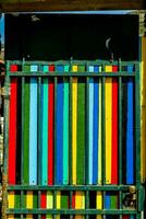 a colorful painted metal gate photo