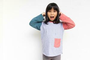 Surprised happy beautiful girl looking at camera in excitement, isolated on white background photo