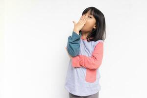 Beautiful girl bored yawning tired covering mouth with hand. Restless and sleepiness. photo