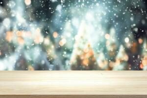 Empty wooden table for present product on christmas tree and bokeh blur background. photo