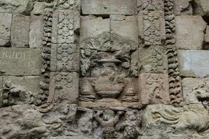 buddha statue in temple . Bas Relief in Templ photo