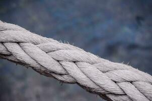 a close up of a rope with a braid photo