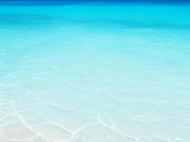 Light blue sea waves with transparent ocean water and light reflections on sandy beach. abstract Water Ripple texture, Sea surface background. photo