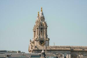 Saint Paul Cathedral with clear sky on sunny day in city photo