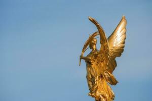 The Golden Angel of Victoria Memorial is the iconic symbol of London photo