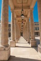 Neoclassical Walkway with Tan Columns photo