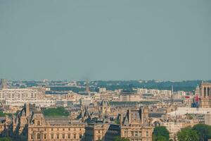 Paris Skyline with Louvre building on the horizon. photo