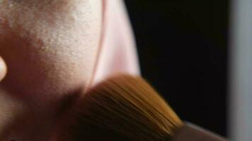 a close up of a woman with a brush video