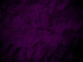 Purple velvet fabric texture used as background. Empty purple fabric background of soft and smooth textile material. There is space for text photo