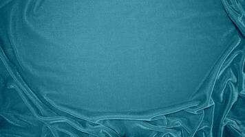 Blue velvet fabric texture used as background. Ocean color panne fabric background of soft and smooth textile material. crushed velvet .luxury navy tone for silk. photo