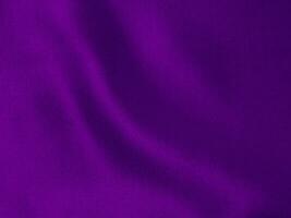 Dark purple velvet fabric texture used as background. Violet color panne fabric background of soft and smooth textile material. crushed velvet .luxury magenta tone for silk. photo