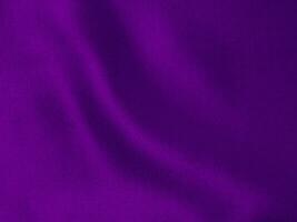 Dark purple velvet fabric texture used as background. Violet color panne fabric background of soft and smooth textile material. crushed velvet .luxury magenta tone for silk. photo