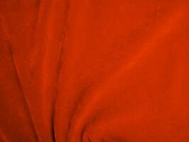 Orange velvet fabric texture used as background. Empty Orange fabric background of soft and smooth textile material. There is space for text.. photo