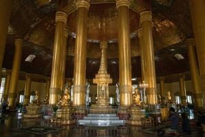 Yangon, Myanmar -December-13-2016 - The Buddha tooth relic pagoda inside the Swe Taw Myat pagoda in the township of Yangon, Myanmar. photo