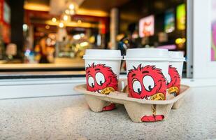 Queenstown, New Zealand - September-24-2017 - Set of plastic cups of Cookie Muncher shop in Queenstown, NZ. photo