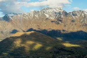 The scenery view of the Remarkables mountain in Queenstown, New Zealand. photo