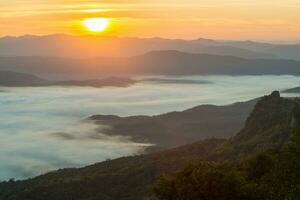 The beautiful sunrise over the mountains range in Doi Samer Dao national park of Nan province of Thailand. photo