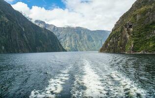 Scenery view of Milford Sound, New Zealand's most spectacular natural attraction in south island of New Zealand view from tour boat. photo