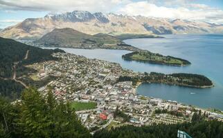 The spectacular view of Queenstown one of the most beautiful town in South Island of New Zealand view from the top of Queenstown skyline on Bob's peak. photo