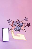 30 percent discount on online purchases. Online offers, comic style numbers next to a cellphone, on a purple background. photo
