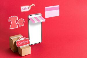 smart phone, credit card and boxes. online store and e-commerce concept. photo